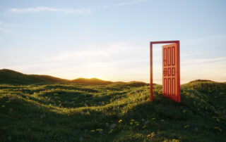 Open door in a field illustrating new beginnings